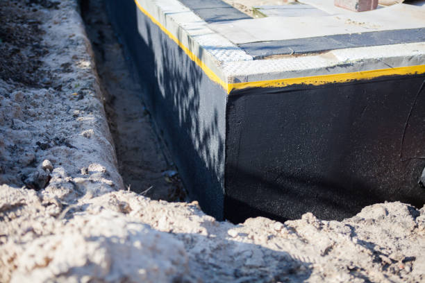 Professional Waterproofing technician working in Alpine, TN